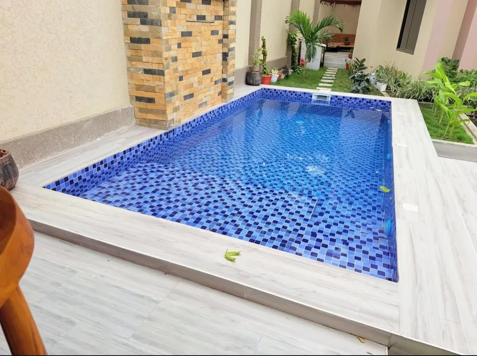 Courtyard mosaic pool in Goba