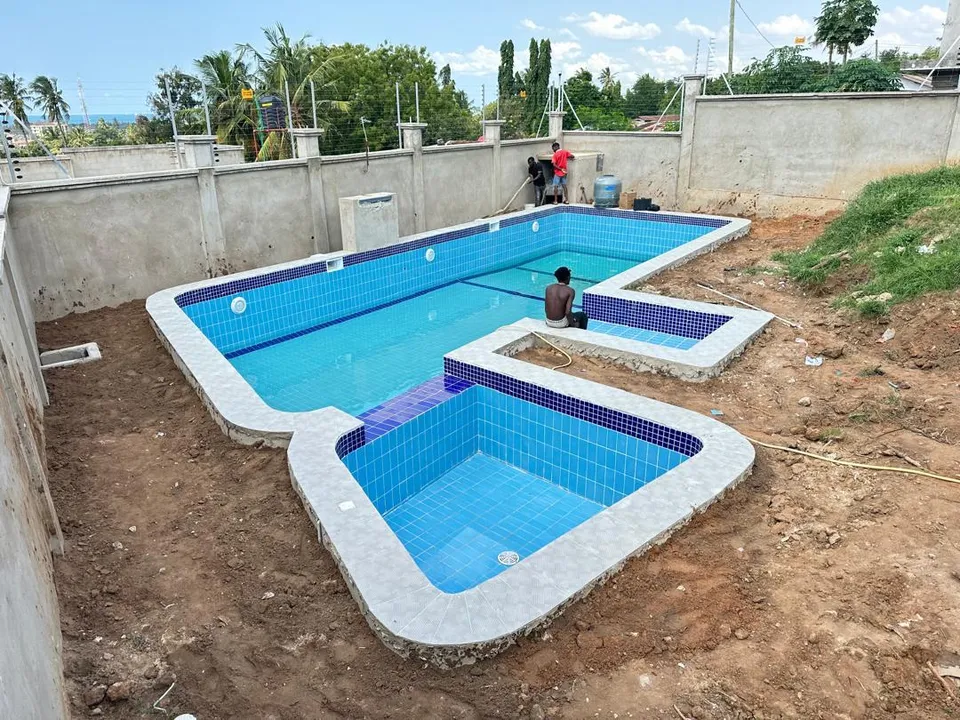 Pool and children's pool at tiling stage in Mbezi Beach, Tangi Bovu